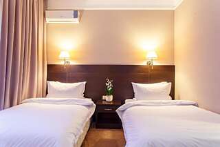 Отель Red Village Hotel Нур-Султан Улучшенный двухместный номер с 2 отдельными кроватями-2